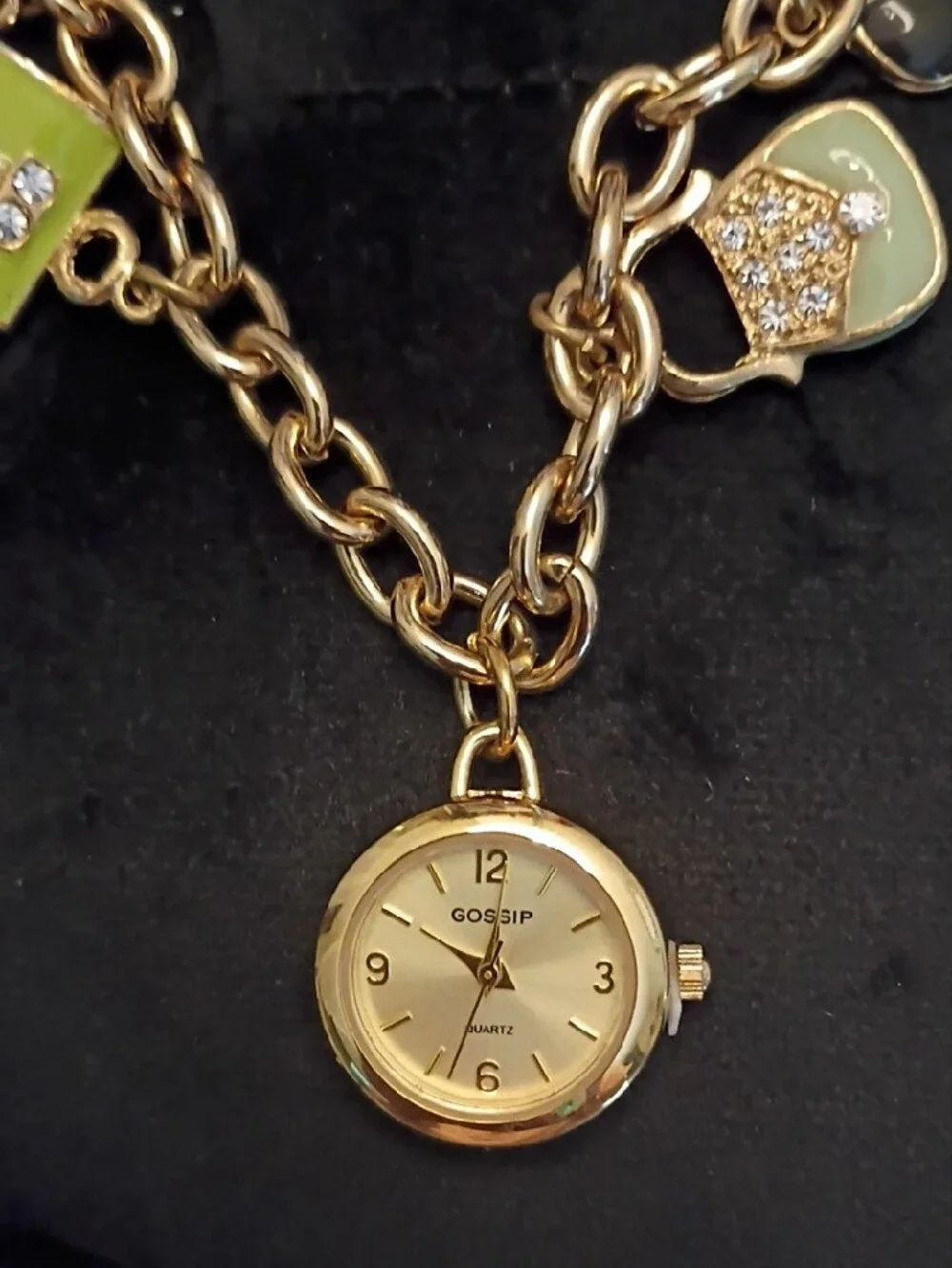 Gossip Gold-Tone Charm Bracelet Watch with Green and Red Accents